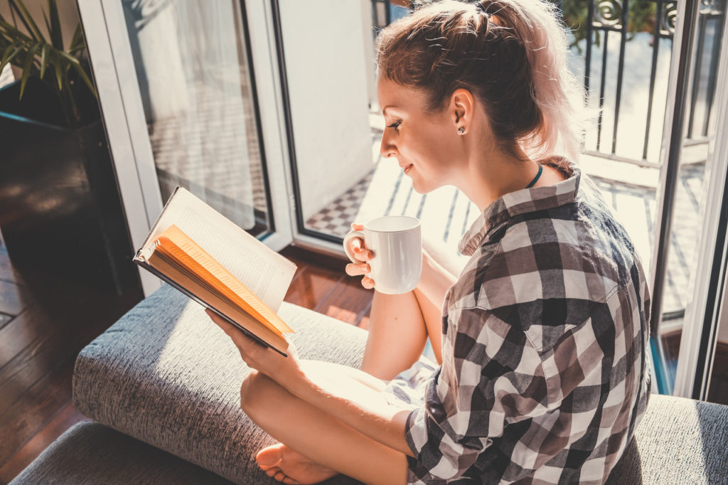 woman reading outside